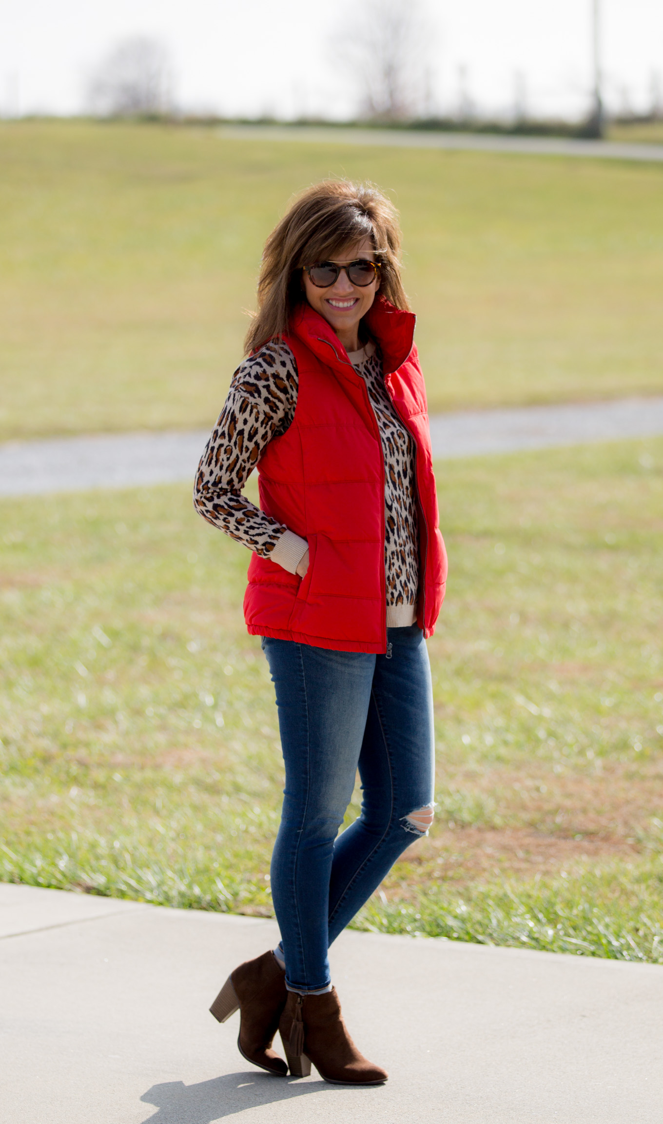 Fashion blogger, Cyndi Spivey, styling a quilted vest from Old Navy.