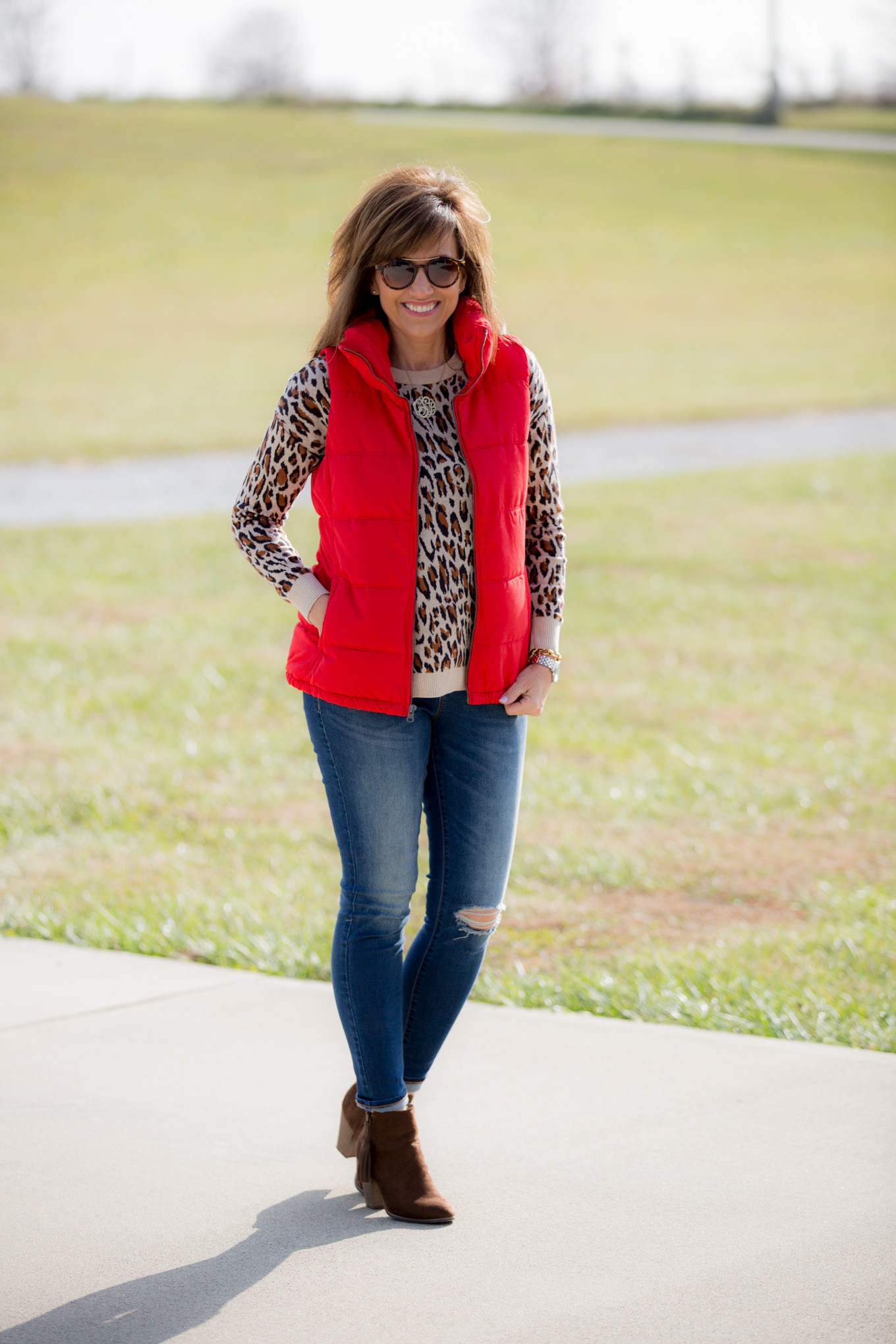 Fashion blogger, Cyndi Spivey, styling a quilted vest from Old Navy.
