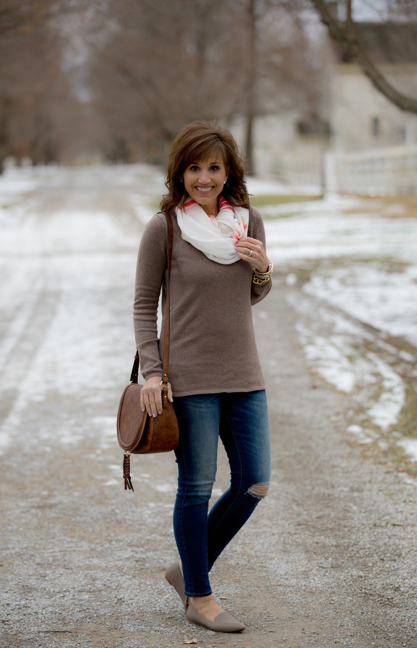 Over 40 fashion blogger, Cyndi Spivey, styling a casual winter outfit.